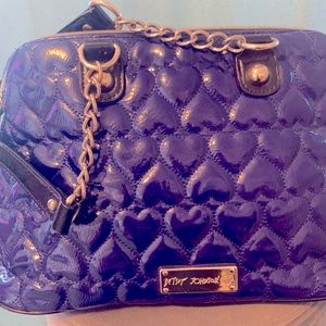 Quilted heart-stitched purse